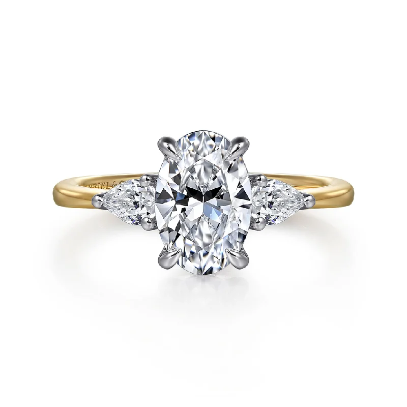 Women's Diamond Rings with Sapphire Accents in Blue for a Colorful and Sophisticated Touch14K Yellow And White Gold 'Sima' Three Stone Oval Diamond Engagement Ring Women's Diamond Rings with Sapphire Accents in Blue for a Colorful and Sophisticated Touch14K Yellow And White Gold 'Sima' Three Stone Oval Diamond Engagement Ring