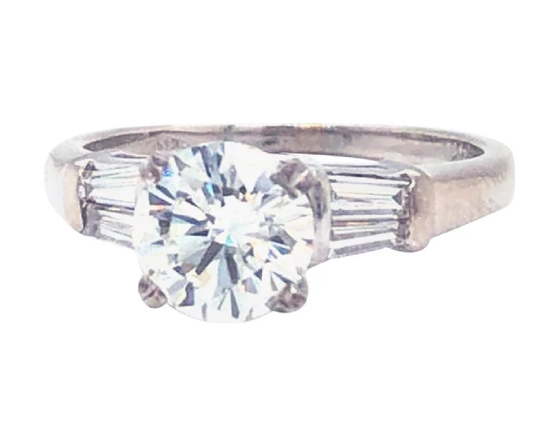 Marquise - Cut Women's Diamond Rings in Palladium for a Unique and Elongated ShapeGIA Certified 1.20 Carat VS1 Round Tapered Baguette Platinum Diamond Ring Marquise - Cut Women's Diamond Rings in Palladium for a Unique and Elongated ShapeGIA Certified 1.20 Carat VS1 Round Tapered Baguette Platinum Diamond Ring