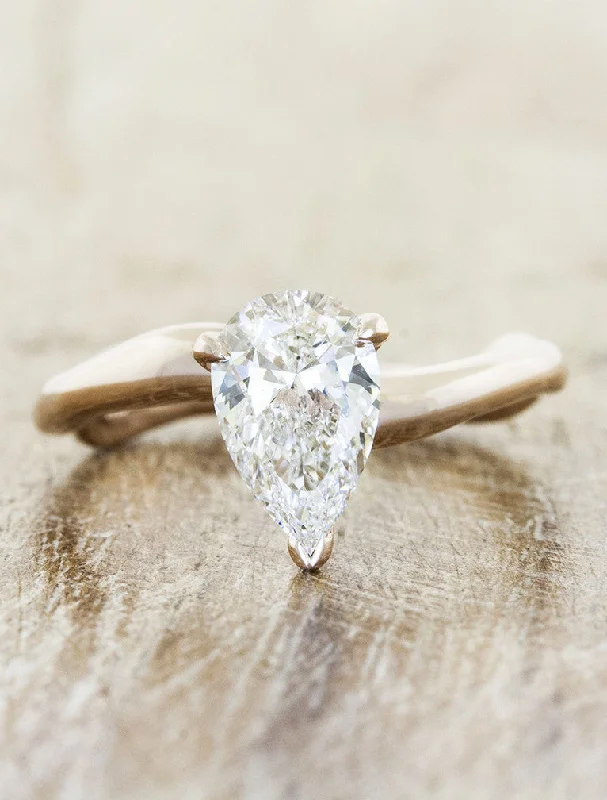 Men's Ruby Engagement Rings in Rose Gold with a Solitaire Design for a Romantic GestureAurora - Pear Men's Ruby Engagement Rings in Rose Gold with a Solitaire Design for a Romantic GestureAurora - Pear