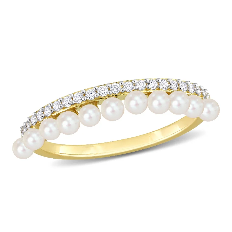 Miadora 2-2.5mm Cultured Freshwater Pearl and 1/6ct TDW Diamond Single Row Ring in 14k Yellow Gold Miadora 2-2.5mm Cultured Freshwater Pearl and 1/6ct TDW Diamond Single Row Ring in 14k Yellow Gold