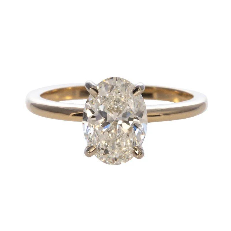Women's Diamond Rings with Sapphire Accents in Blue for a Colorful and Sophisticated Touch2ct Oval Diamond Solitaire 14K Gold Two Tone Engagement Ring Women's Diamond Rings with Sapphire Accents in Blue for a Colorful and Sophisticated Touch2ct Oval Diamond Solitaire 14K Gold Two Tone Engagement Ring