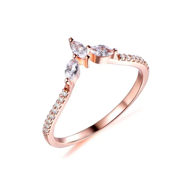 Anniversary rings with a halo setting around the center stoneThree-Stone Marquise Diamond Tiara Wedding Ring 14K Rose Gold Anniversary rings with a halo setting around the center stoneThree-Stone Marquise Diamond Tiara Wedding Ring 14K Rose Gold