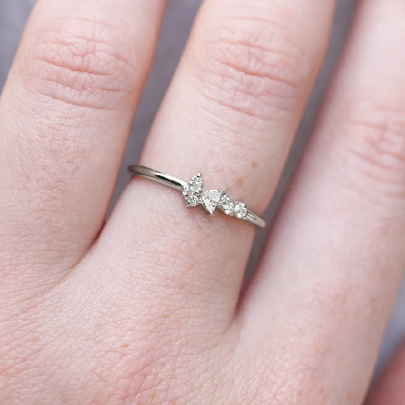 Halo - Style Women's Diamond Rings with a Center Diamond Surrounded by Smaller Diamonds in 18K GoldElena Ring | white diamonds Halo - Style Women's Diamond Rings with a Center Diamond Surrounded by Smaller Diamonds in 18K GoldElena Ring | white diamonds