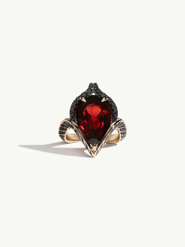 Engagement - Inspired Women's Rings with a Halo of Small DiamondsOceanna Ring With Red Garnet & Brilliant-Cut Black Diamonds In 18K Yellow Gold Engagement - Inspired Women's Rings with a Halo of Small DiamondsOceanna Ring With Red Garnet & Brilliant-Cut Black Diamonds In 18K Yellow Gold
