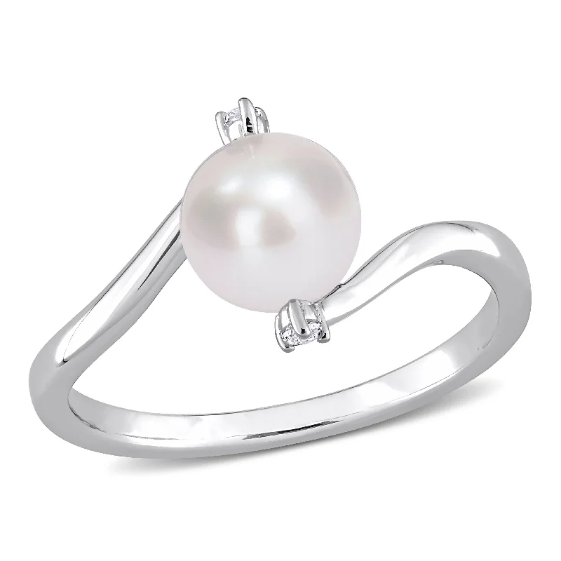 Miadora Sterling Silver Cultured FW Pearl & Created White Sapphire 3-Stone Bypass Ring (7-7.5mm) Miadora Sterling Silver Cultured FW Pearl & Created White Sapphire 3-Stone Bypass Ring (7-7.5mm)