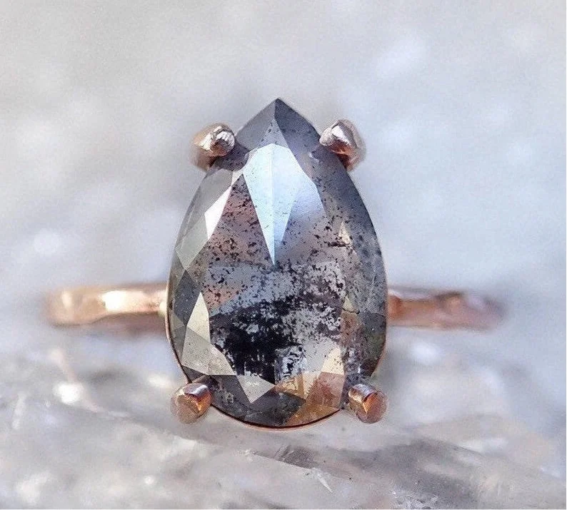 Women's Solitaire Diamond Rings with Round - Cut Diamonds and Platinum Settings for an Elegant EngagementCustom: Pear Salt and Pepper Diamond Ring Women's Solitaire Diamond Rings with Round - Cut Diamonds and Platinum Settings for an Elegant EngagementCustom: Pear Salt and Pepper Diamond Ring
