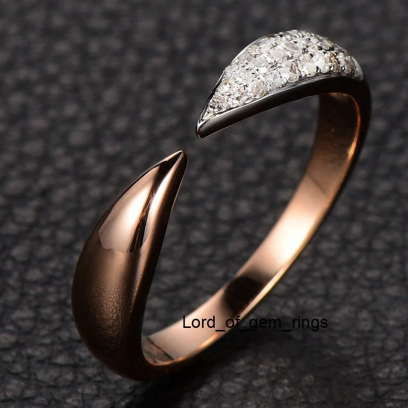 Anniversary rings with a halo setting around the center stoneContemporary Tapered Diamond Open Ring 14K Rose Gold Anniversary rings with a halo setting around the center stoneContemporary Tapered Diamond Open Ring 14K Rose Gold
