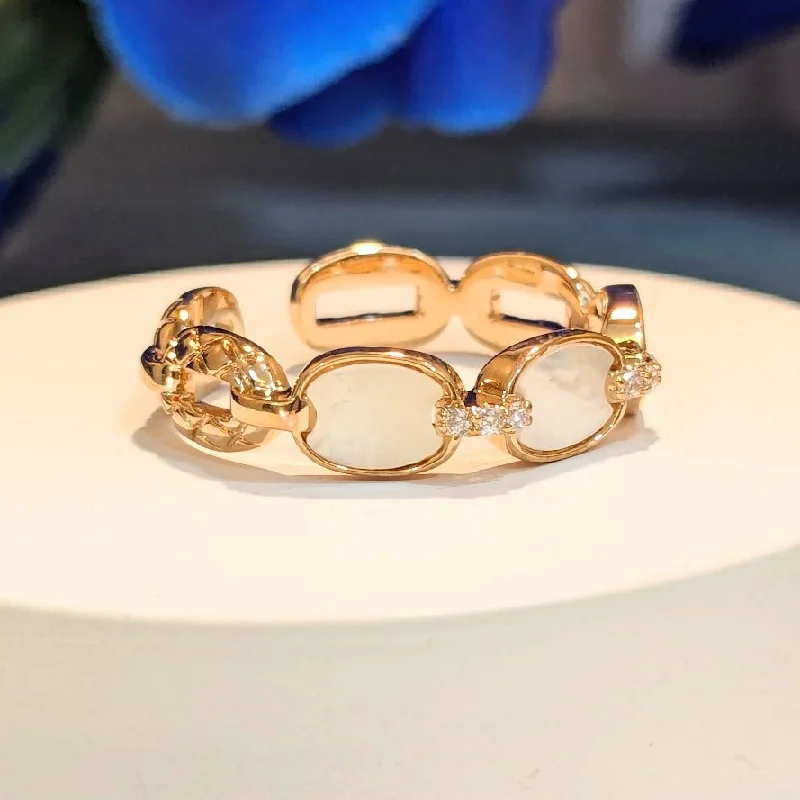 PRIMA DONNA SERIES - Oval Mother of Pearls Rose Gold Plated Linear Adjustable Finger Ring in Brass PRIMA DONNA SERIES - Oval Mother of Pearls Rose Gold Plated Linear Adjustable Finger Ring in Brass