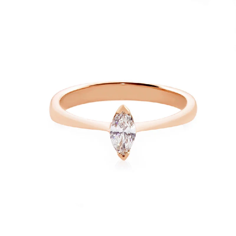 Cushion - Cut Halo Engagement Rings with a Platinum Band and Micro - Pave DetailsCertified Marquise Cut Diamond Solitaire Ring in Rose Gold Cushion - Cut Halo Engagement Rings with a Platinum Band and Micro - Pave DetailsCertified Marquise Cut Diamond Solitaire Ring in Rose Gold