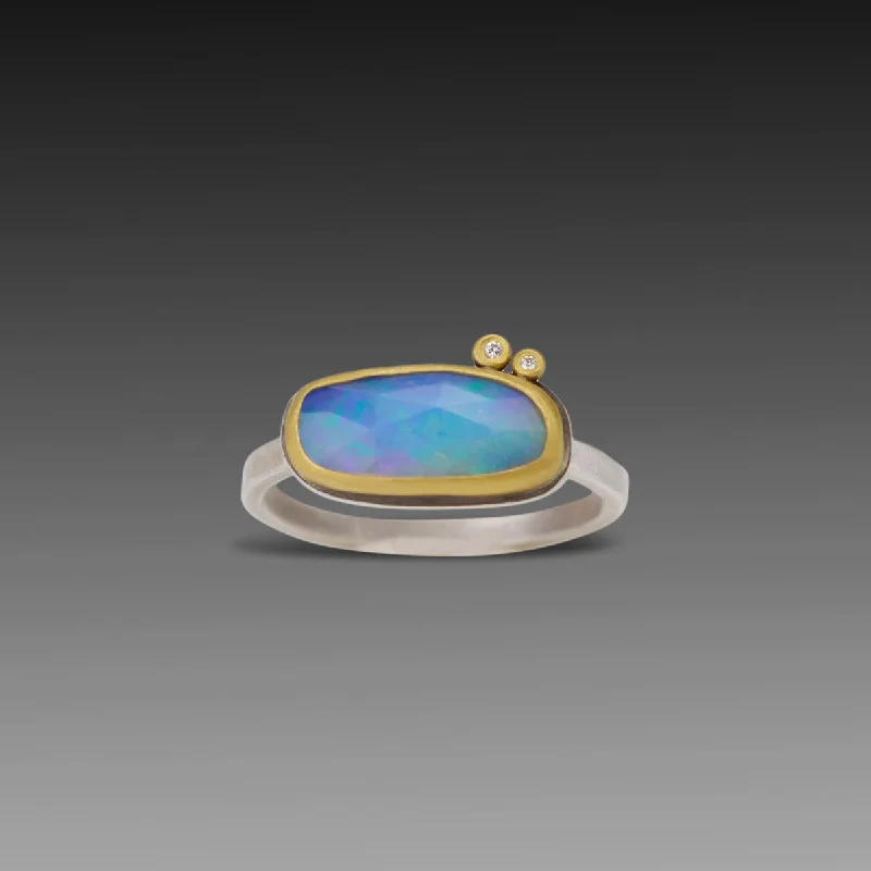 Peridot Gemstone Rings in 14K Gold - Filled Metal with a Pave - Set Band for a Sparkling LookEthiopian Opal Ring with Two Diamonds Peridot Gemstone Rings in 14K Gold - Filled Metal with a Pave - Set Band for a Sparkling LookEthiopian Opal Ring with Two Diamonds
