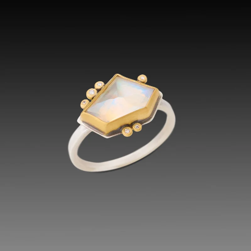 Malachite Gemstone Rings in 14K Gold with a Carved Stone for a Unique and Artistic AppealGeometric Rainbow Moonstone Ring with Diamonds Malachite Gemstone Rings in 14K Gold with a Carved Stone for a Unique and Artistic AppealGeometric Rainbow Moonstone Ring with Diamonds