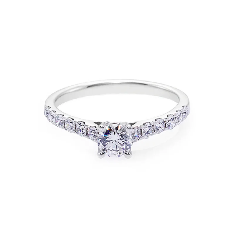 Cushion - Cut Halo Engagement Rings with a Platinum Band and Micro - Pave DetailsSolitaire Diamond Engagement Ring Cushion - Cut Halo Engagement Rings with a Platinum Band and Micro - Pave DetailsSolitaire Diamond Engagement Ring
