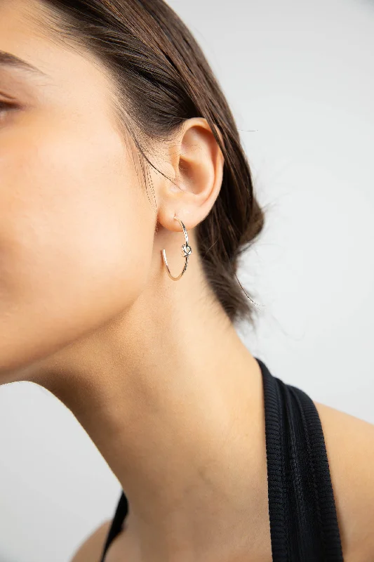 Huggie hoop earringsKNOT HOOP EARRING