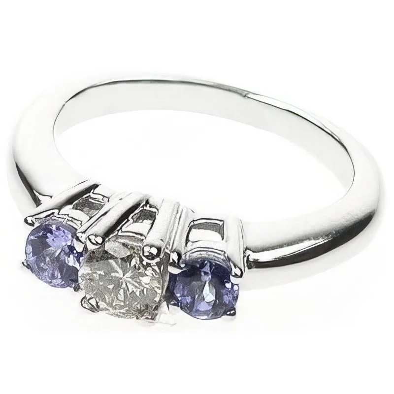 Commemorate rings with a diamond - and - garnet combination0.90 CT Round Cut Blue Sapphires & Diamonds - Three Stone Ring Commemorate rings with a diamond - and - garnet combination0.90 CT Round Cut Blue Sapphires & Diamonds - Three Stone Ring