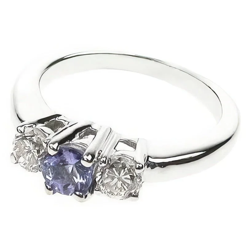 Commemorate rings with a star - shaped diamond setting0.90 CT Round Cut Diamonds & Tanzanites - Three Stone Ring