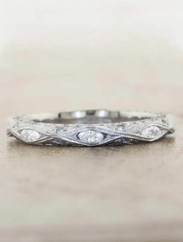 Commemorate rings with a diamond - encrusted band for a sparkly lookOdessa