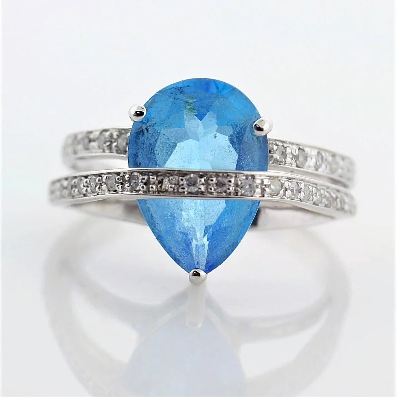 Commemorate rings with a bezel - set turquoise stonePear Shaped Blue Topaz Diamond Ring 14K White Gold Commemorate rings with a bezel - set turquoise stonePear Shaped Blue Topaz Diamond Ring 14K White Gold